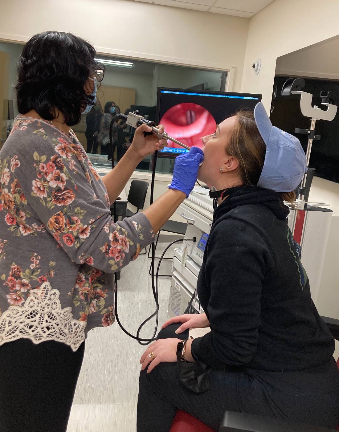Performing a laryngeal endoscopy on a volunteer